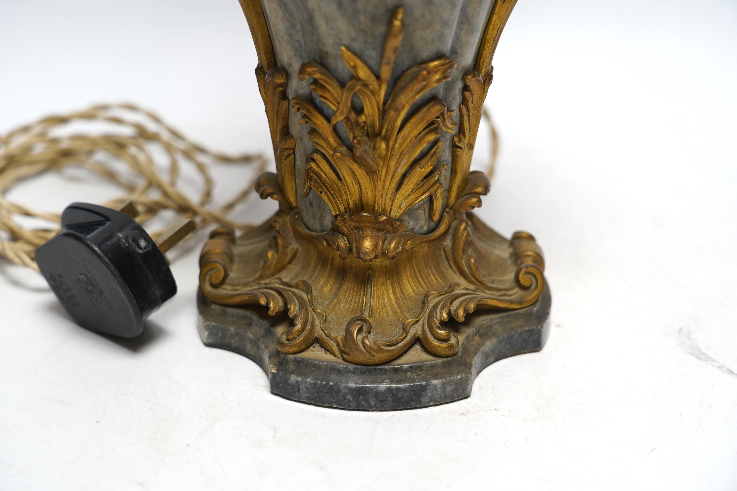 A 19th century French rococo style ormolu mounted grey marble lamp, converted to electricity, 29cm excluding light fittings